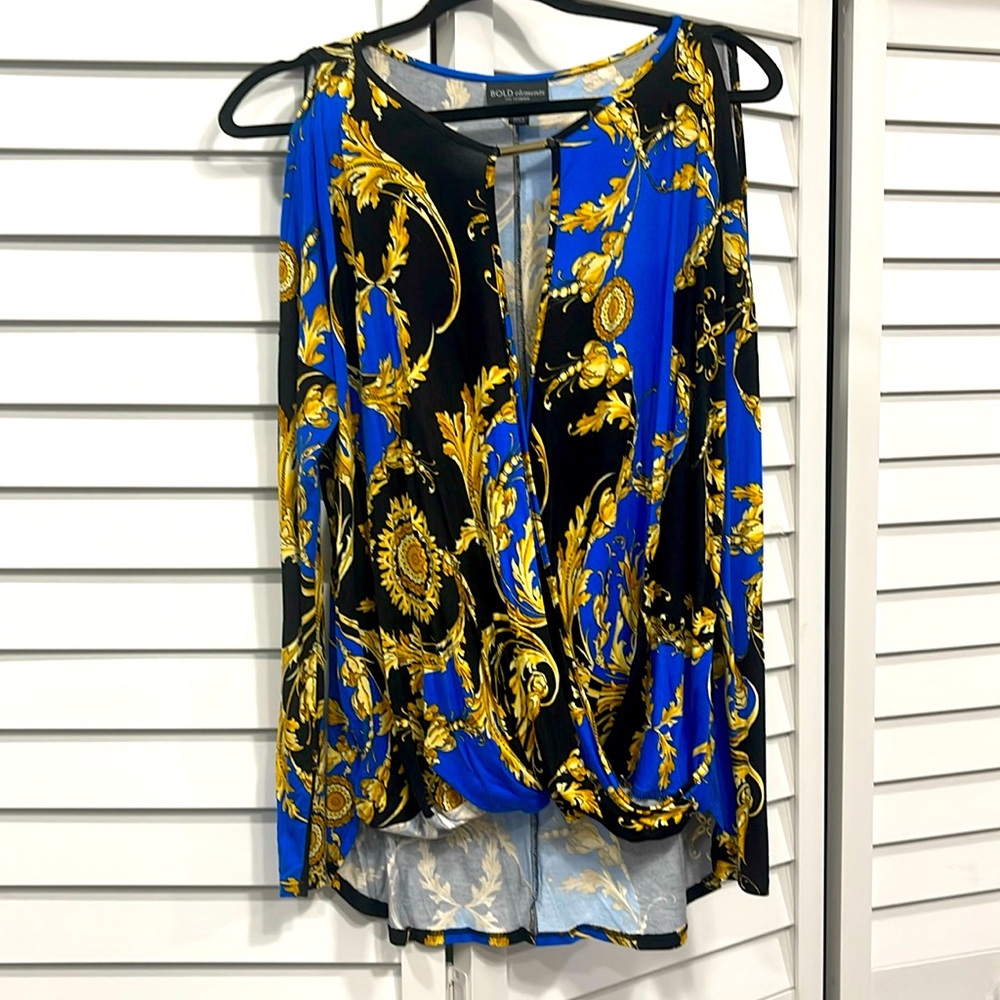 Long sleeve, cold shoulder, high-low style shirt